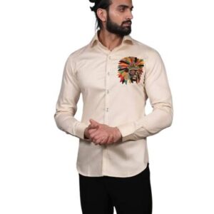 Long-sleeved, collared shirt in a light, off-white, or cream color