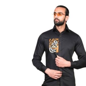 "Bold Embroidery, Defined Look." Black shirt